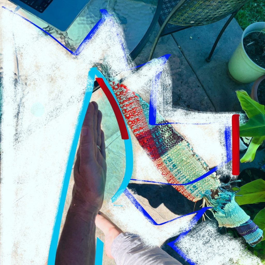 overhead photo of a desk with computer on it, plus shadow of a foot in shiva position, a hand pointing to a computer and sketchy lines. "Abstract Collage"